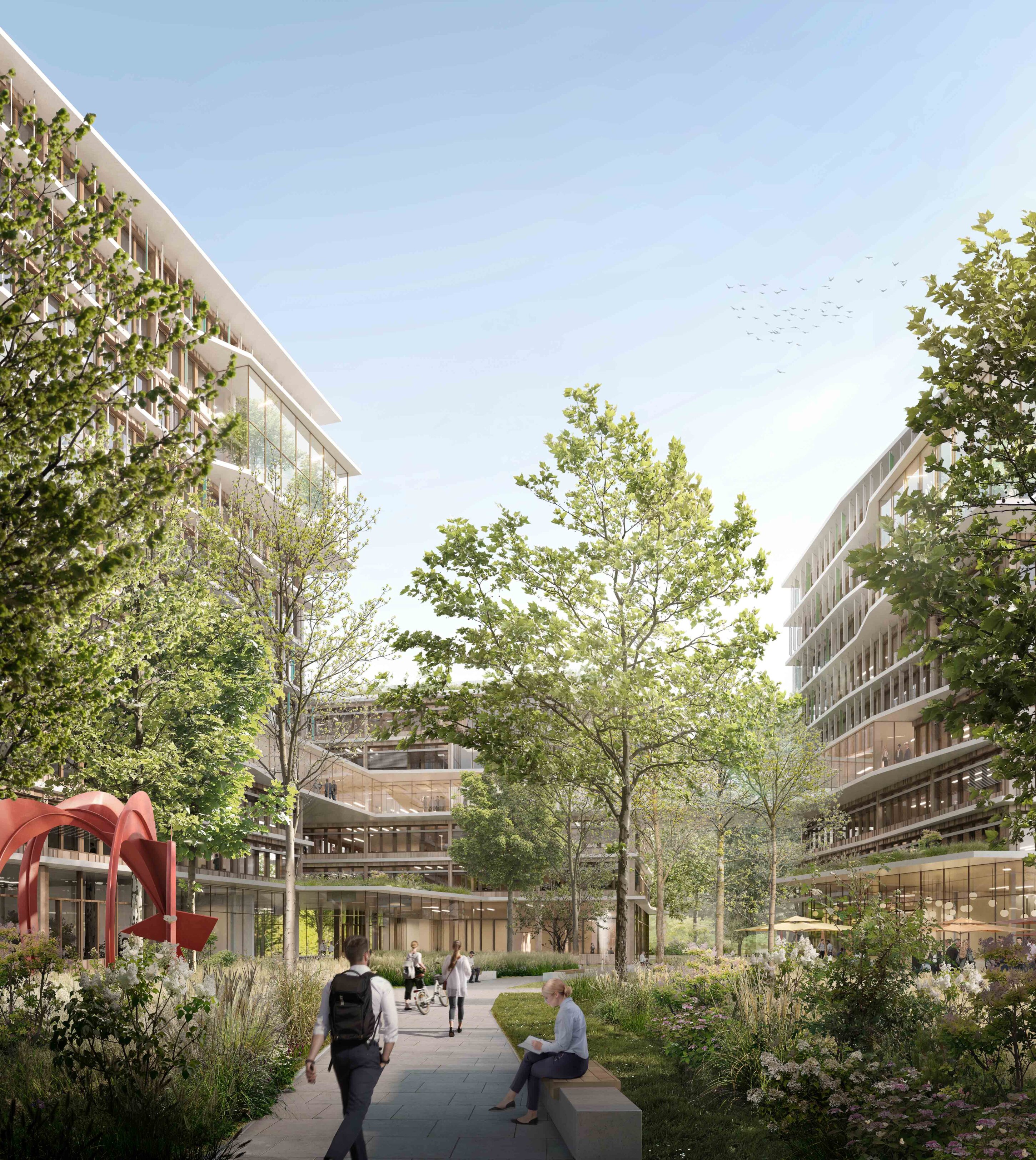 Project by Behnisch Architekturbuero, Campus Giesing. Landscaped courtyard between modern buildings with trees, pathways, and people walking, sitting, and cycling under a clear sky.
