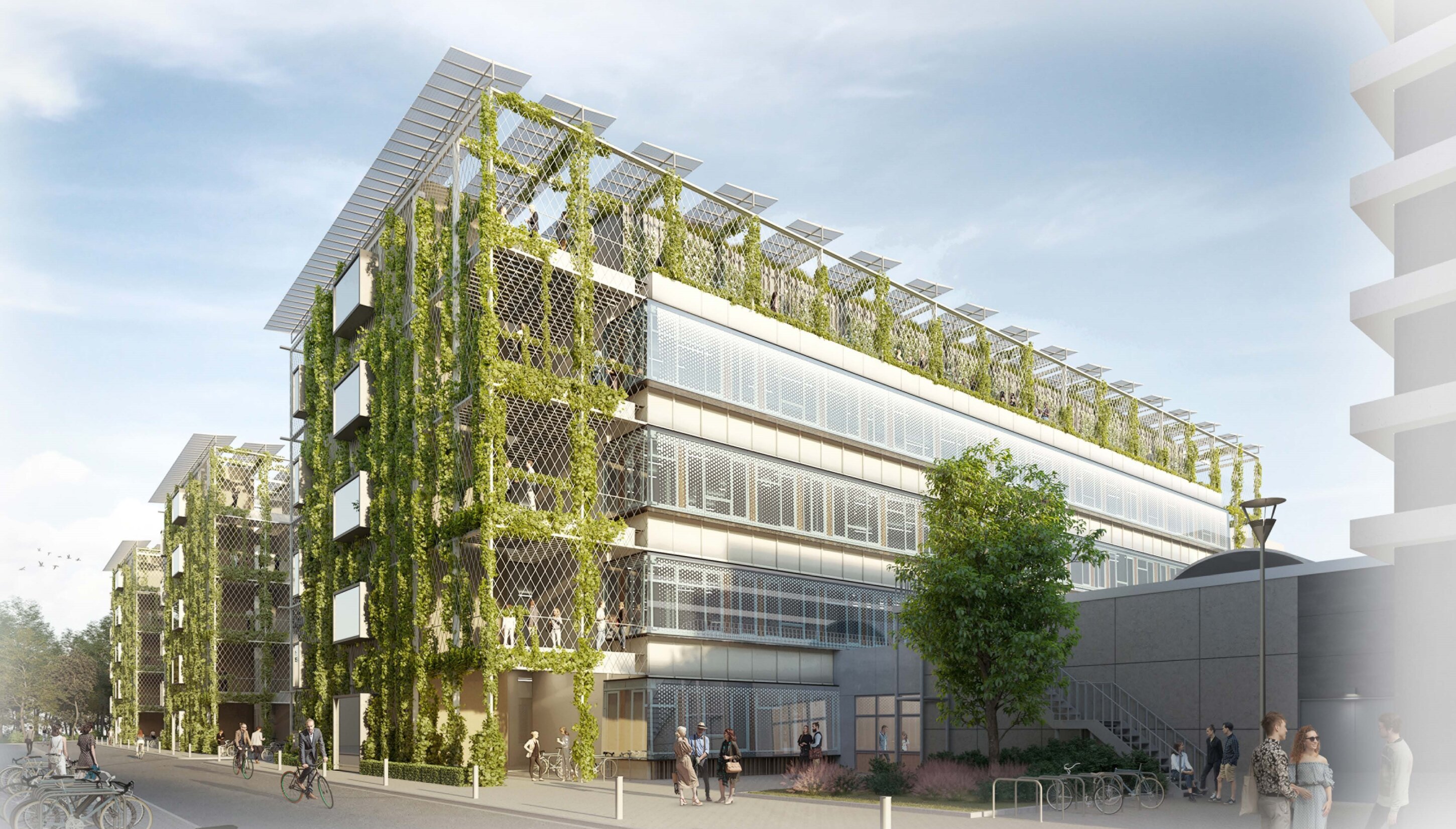 Project by Behnisch Architekturbuero, Facade of the Pre-Clinical Building University.Modern multi-story building with green facade of climbing plants, balconies, and people walking and cycling along the street.