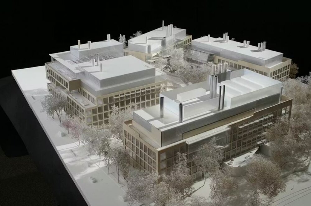 Project by Behnisch Architekturbuero, Harvard University Science and Engineering Complex (SEC). Scale model of a campus with multiple rectangular buildings, flat roofs, chimneys, and trees arranged around courtyards.